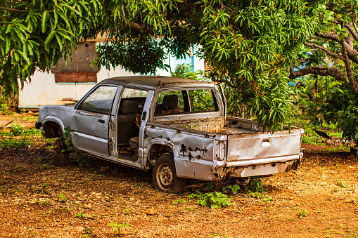 Abandoned, rusty and broken down truck. Photographed while documenting the lifestyle in the South Pacific Islands of Tonga.