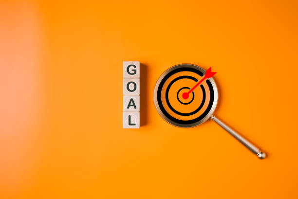 istock Magnifying glass with goal icons for increasing successful project plan, Business strategy planning management, Business goal, Innovation and inspiration for creativity idea thinking 1694235154