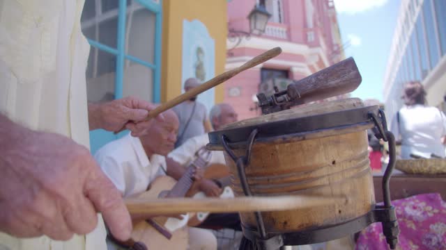 Close-up of cuban conga drum playing outdoors