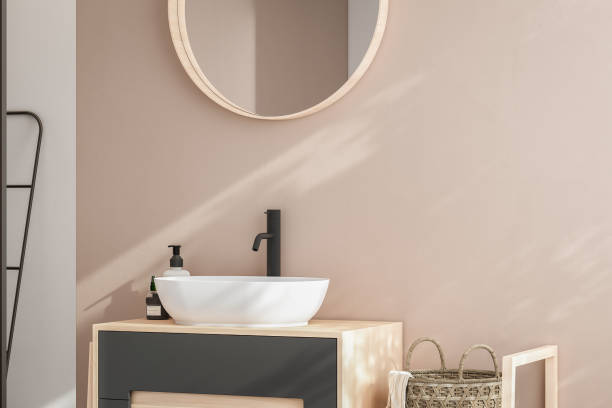 istock Realistic 3D render close up elegant bathroom vanity countertop with white ceramic wash basin and faucet. 1694252344