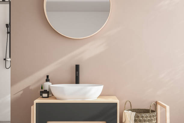 istock Realistic 3D render close up elegant bathroom vanity countertop with white ceramic wash basin and faucet. 1694252863