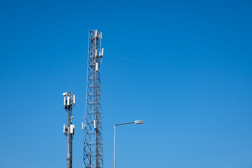 mobile communication base stations. blue sky.