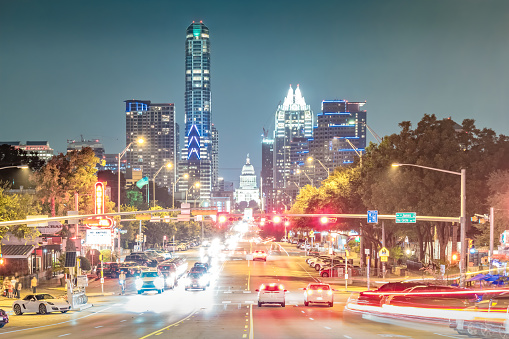 Congress Avenue in downtown Austin, Texas, USA at night.