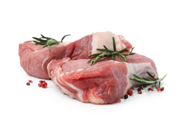 istock Fresh raw meat with rosemary and spices isolated on white 1694448882