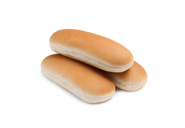 istock Tasty fresh buns for hot dogs on white background 1694457481