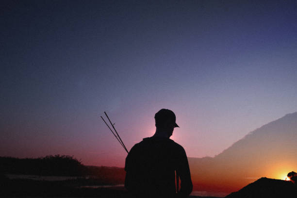 istock Lonely fisherman 1694490665