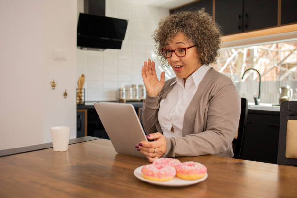istock Portrait of a mature woman using digital tablet 1694498770