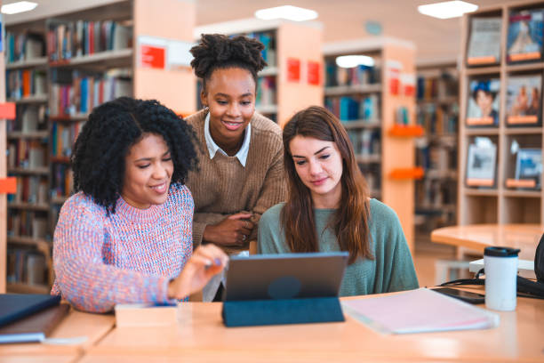 istock Diverse Females Studying In A Library 1694509339