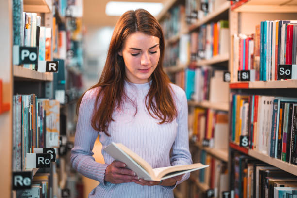 istock Caucasian Female In A Library 1694509376