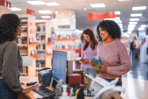 istock People In Line Borrowing A Book In A Library 1694509400