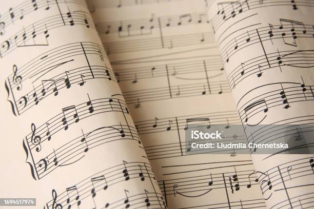 Closeup View Of Sheets With Music Notes Stock Photo - Download Image Now - Art, Black Color, Chord