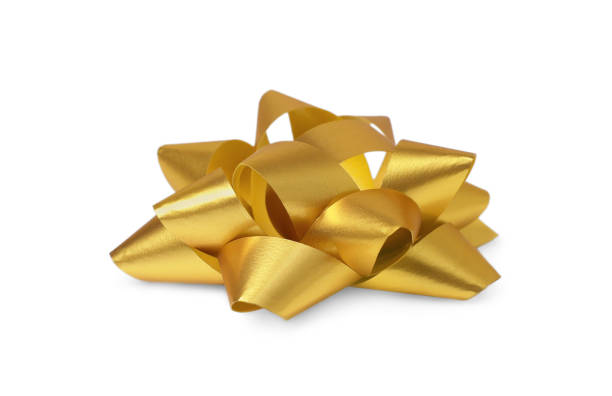 Golden gift bow isolated on white. Festive decor