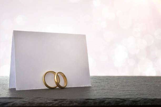 istock Banner with rings on slate stone and background with bokeh 1694570945