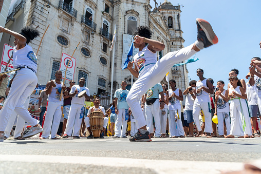 Salvador, Bahia, Brazil - December 08, 2022: People are seen playing capoeira during the Catholic tribute to Nossa Senhora da Conceicao da Praia in the city of Salvador, Bahia.