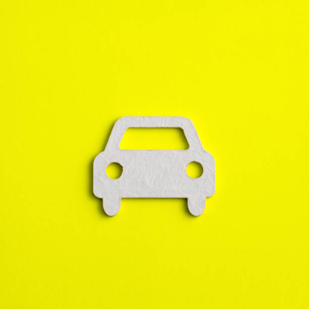 istock car icon on yellow color background - eco car concept, clean environment 1694592062