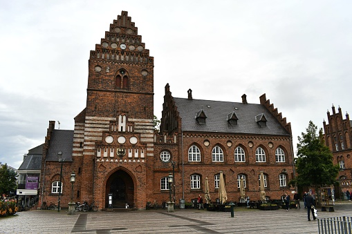 The outdoor brick exterior of the Roskilde city hall in Denmark