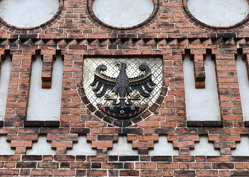 A Griffin decoration on an old building on the exterior architecture in Roskilde, Denmark