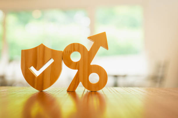 Shield protect icon with Percent symbol, for controlling and protecting deposit interest and loan interest.