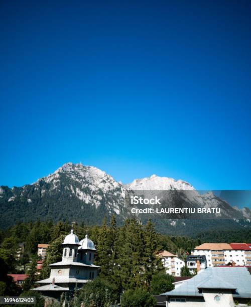 Busteni Mountain Peak Towards The Caraiman Cross Stock Photo - Download Image Now - Blue, Carpathian Mountain Range, City