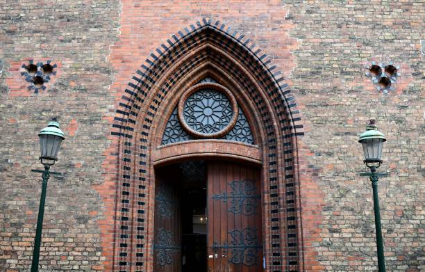 A closer up shot on a partially opened church door in Malmo Sweden