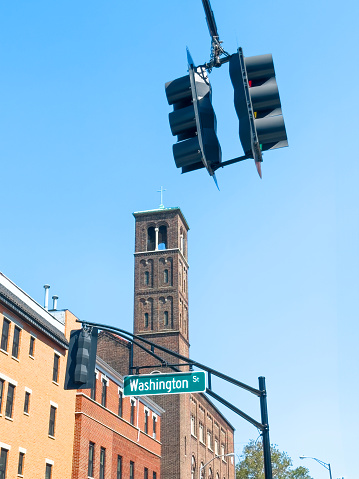Traffic lights and Hoboken building details in front of a clear sky