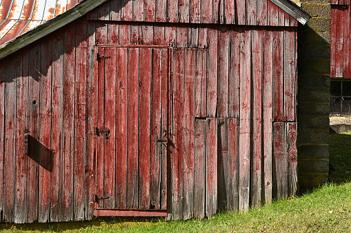 Detail of old red barn in strong sunlight, Connecticut