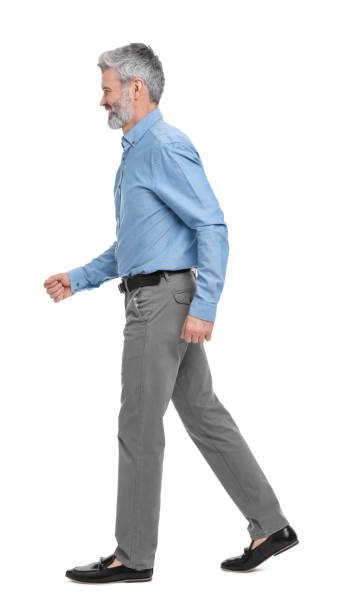 istock Mature businessman in stylish clothes posing on white background 1694639006