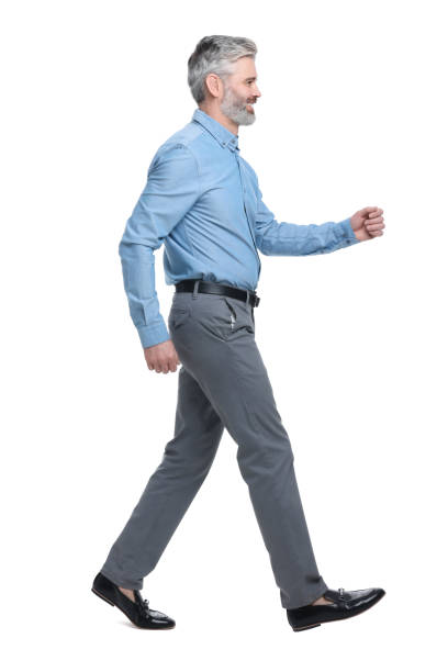 istock Mature businessman in stylish clothes posing on white background 1694639572