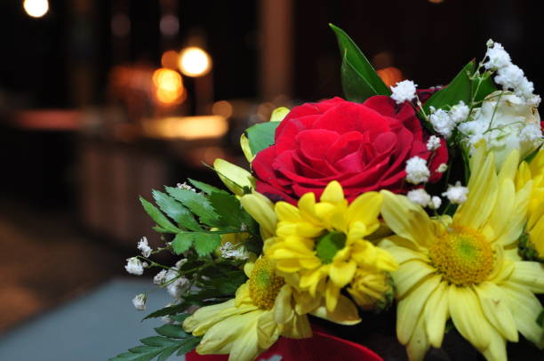 istock flower arrangement on the table 1694640140