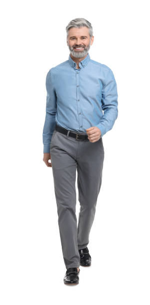 istock Mature businessman in stylish clothes posing on white background 1694640719