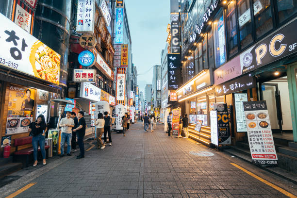 seoul has many pedestrian streets were you can find cafes and restaurants seoul, south korea. 3rd july, 2023: views of famous Myeong-Dong Walking Street in seoul city kangnamgu stock pictures, royalty-free photos & images