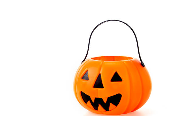 istock Halloween Jack o Lantern Pumpkin with a spooky face 1694738253
