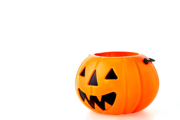 istock Halloween Jack o Lantern Pumpkin with a spooky face 1694738255