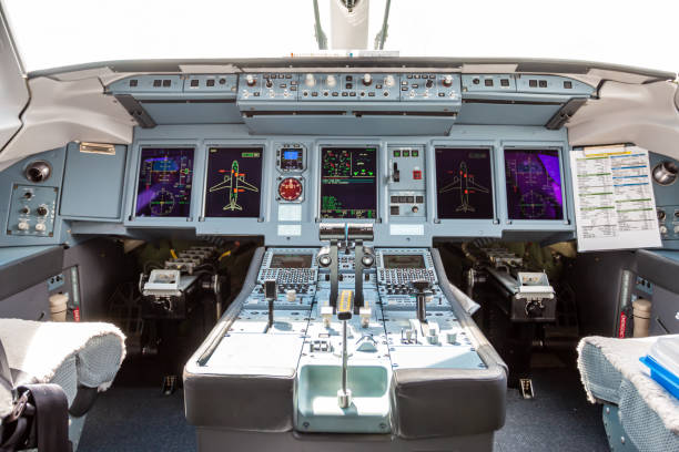 inside the cockpit of a passenger airplane - cockpit dashboard airplane control panel imagens e fotografias de stock