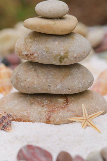 Balance stone can me all about balance, serenity and love. Helps you meditate and concentrate and be one Winthrop the universe. It’s a spiritual experience  and at the bottoms of the rocks you can see shells and starfish.