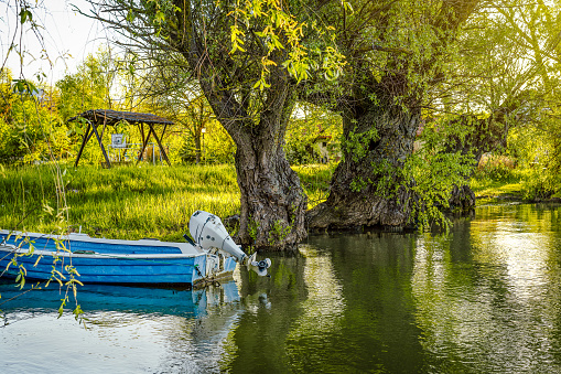 Fishing boat on river in the morning