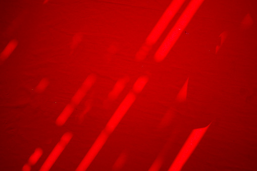 light and shadow pattern on red area