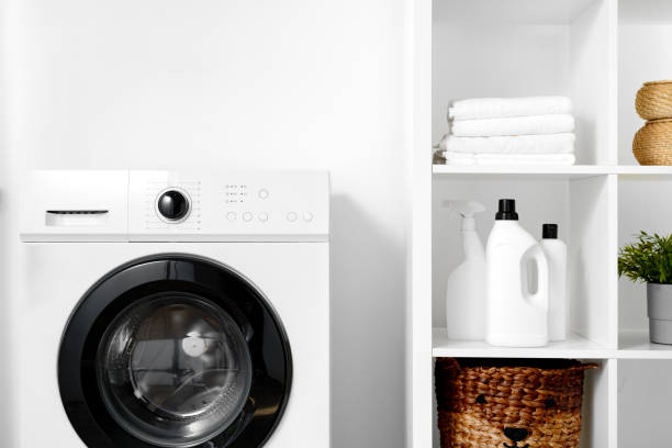 istock Close up of washing machine in a laundry room 1694884726