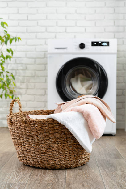 istock Modern white washing machine close up photo 1694893863
