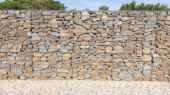 background gabion fence big cage wall facade of wall building