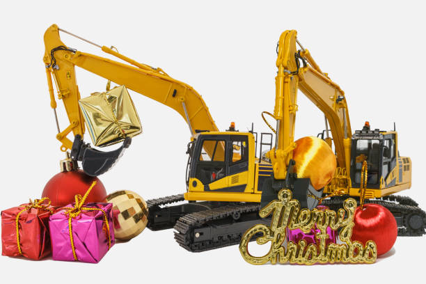 istock Christmas ornament and Excavator model 1694909356