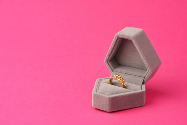 istock Small jewelry box on pink studio background 1694910439