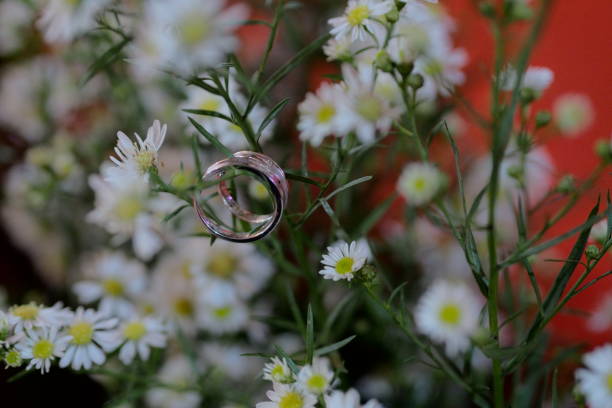 a pair of rings in flowers