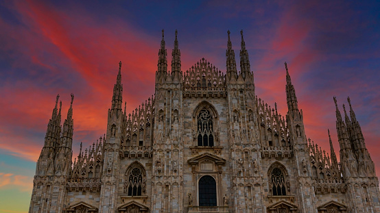 The sunset view with Milan Cathedral, Duomo di Milano, one of the largest churches in the world and the famous of destination tourist