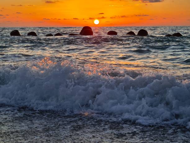 istock sunset over the calm sea on a beautiful day 1694987300