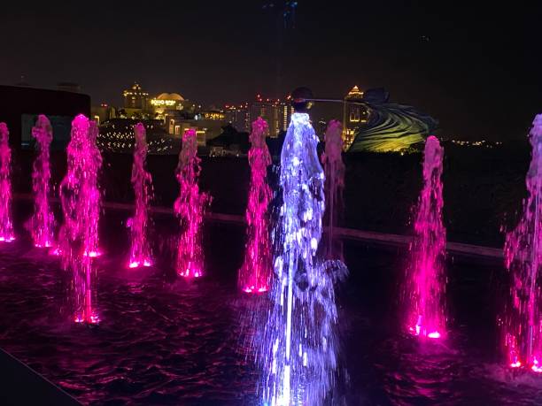 istock Qatar - Doha - Katara illuminated fountain 1694987306