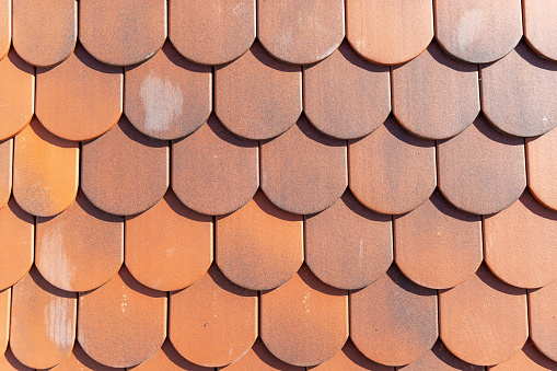 Roof tiles pattern. Roof tiles texture background. Roof tile pattern