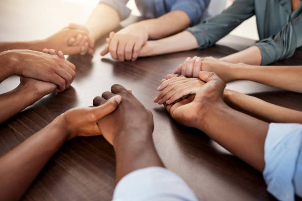 istock Diversity, hands holding and business partnership for support, motivation and teamwork. Friends connecting hand, collaboration together sharing success goal vision together and team building. 1695036377