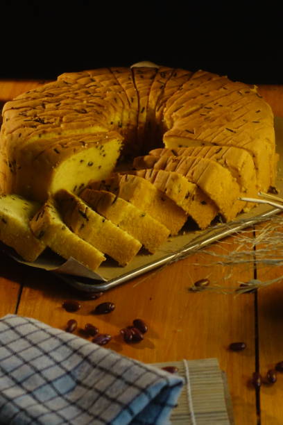 istock Sponge cake on wooden table. 1695065273