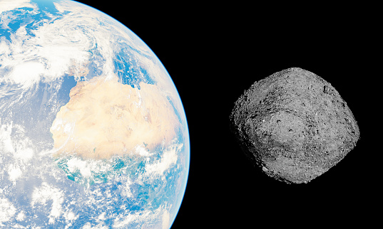 Close-up of the asteroid Bennu approaching Earth through empty space. Possible collision in the year 2182. Elements provided by NASA. 3d rendering
